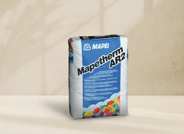 Produktové balení fasádního lepidla Mapetherm AR2 pro perlinku a izolace.