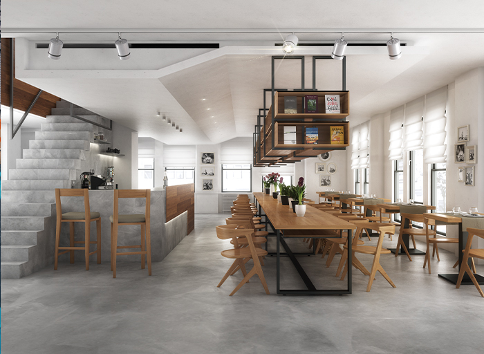 Moderní interiér kavárny s betonovou podlahou
